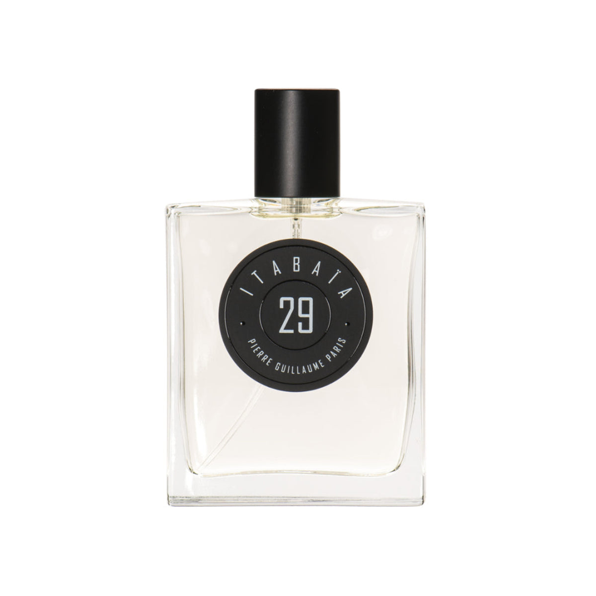 Perfume bottle with black cap and label on a white background